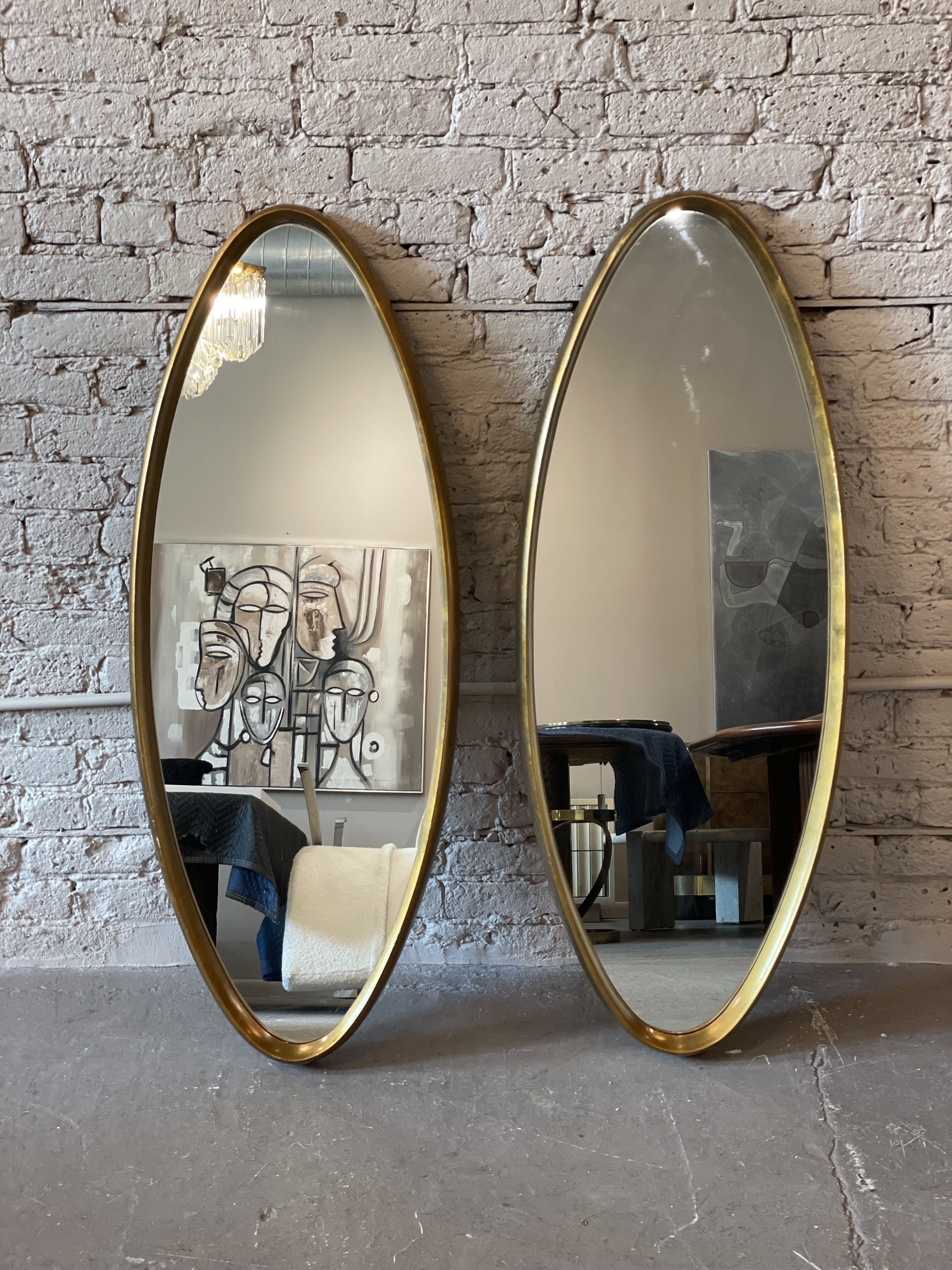Vintage Gold Gilt Oval Mirrors - a Pair